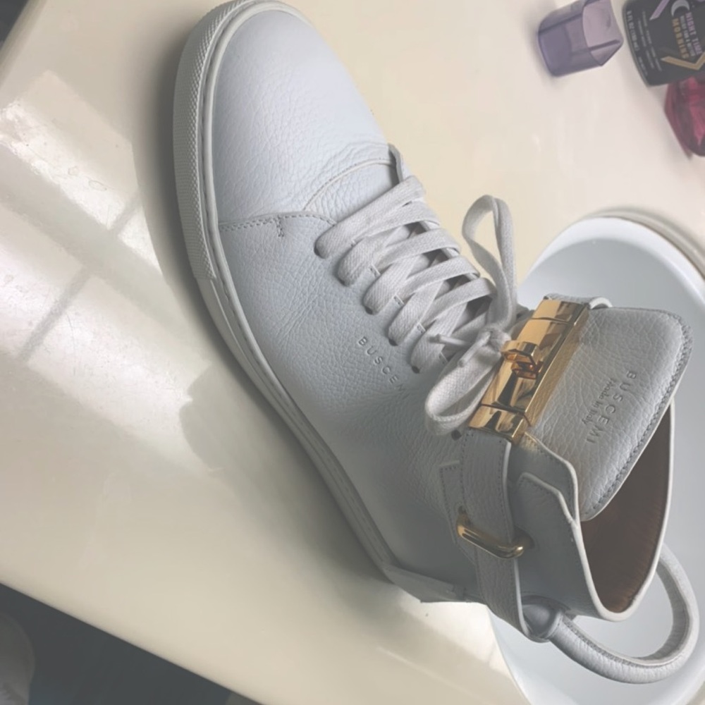 “BUSCEMI” Alce high top gently used in original packaging asking$800(obo)